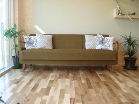 An image showing a stylish sofa at Loch Ken Eco Bothies self catering accommodation eco retreats in 